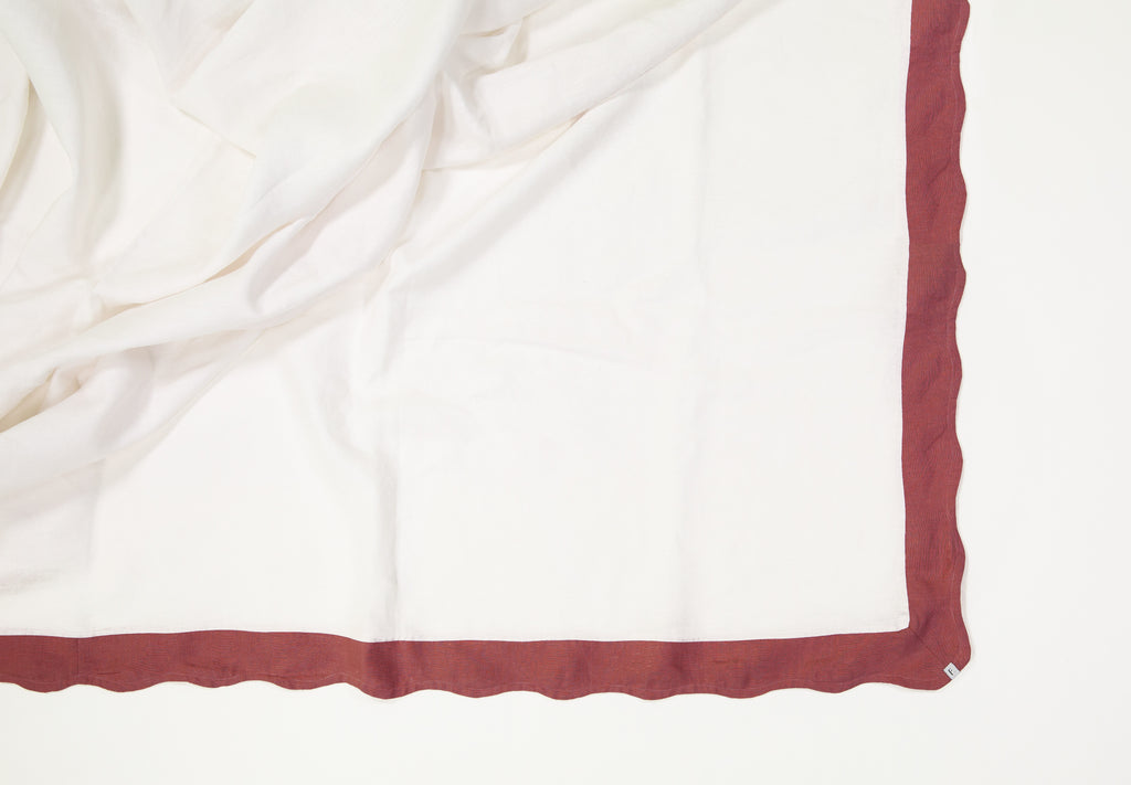 White Tablecloth with Dusty Red Wave