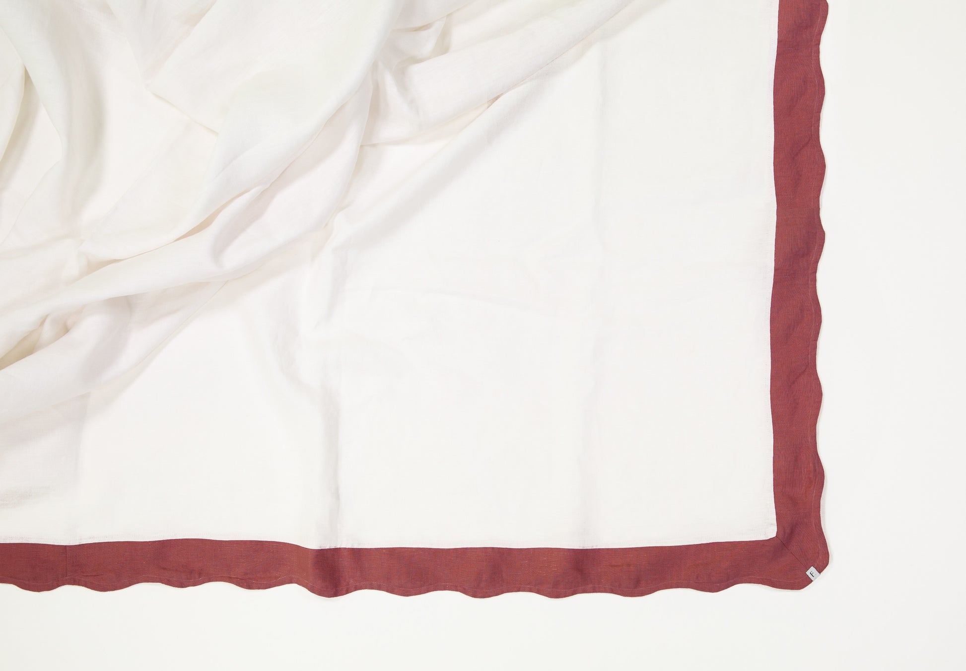 White Tablecloth with Dusty Red Wave